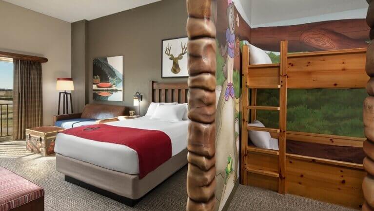 The bunk beds in the den and the bed in the accessible Wolf Den Suite (Accessible bathtub)